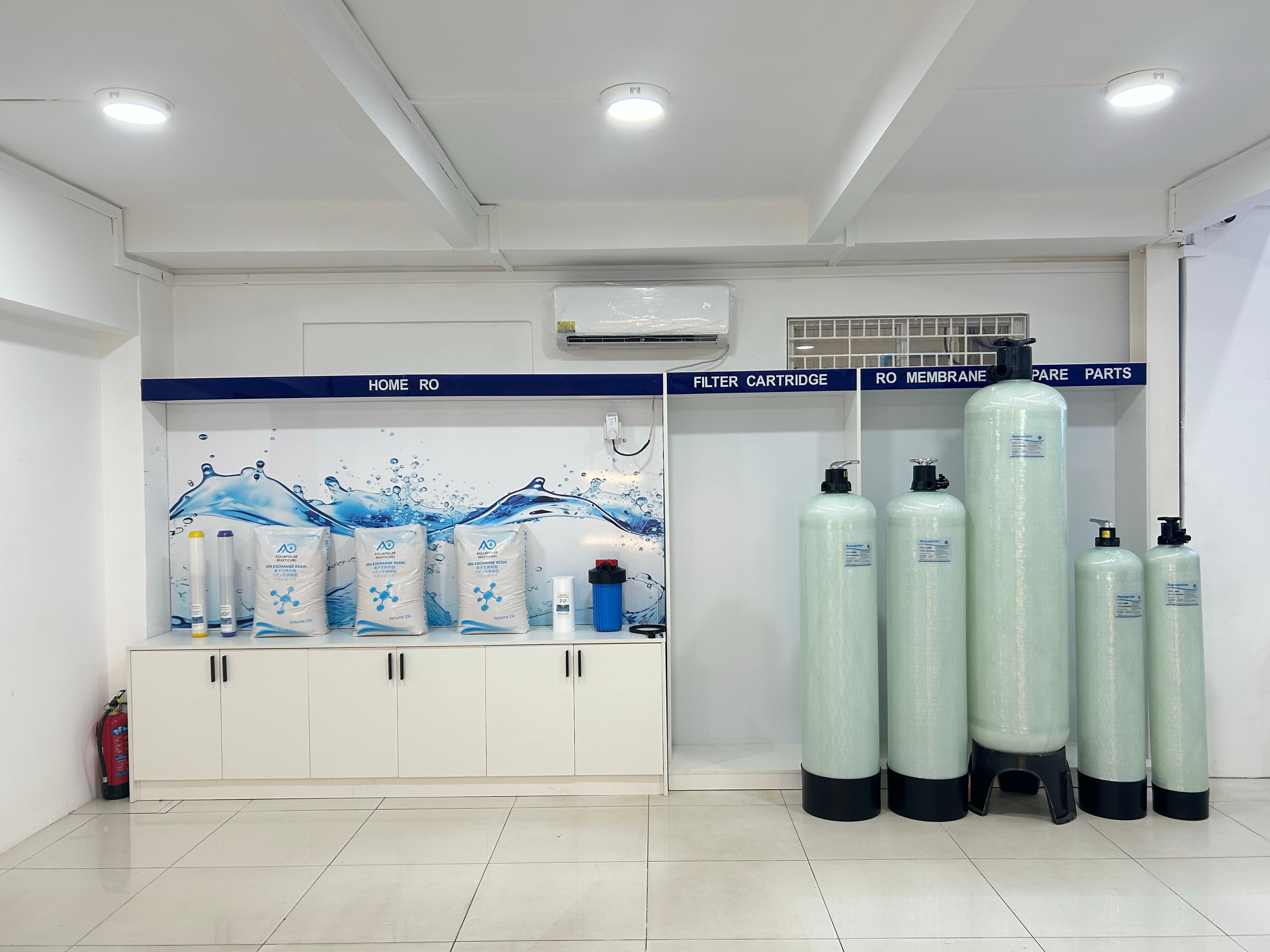 FRP tanks in a clean AQUAPOLAR showroom display
