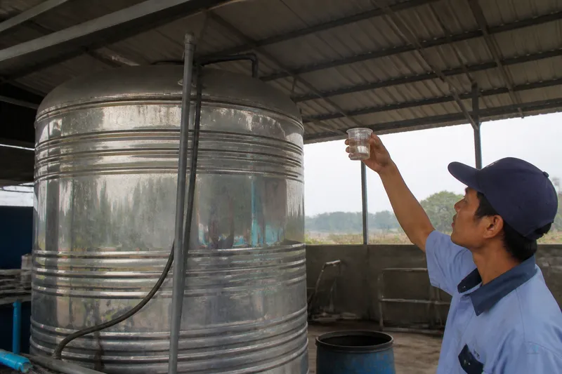 Feed-water sampling scene — borehole, municipal tie-in, or tanker supply notes on a factory brief