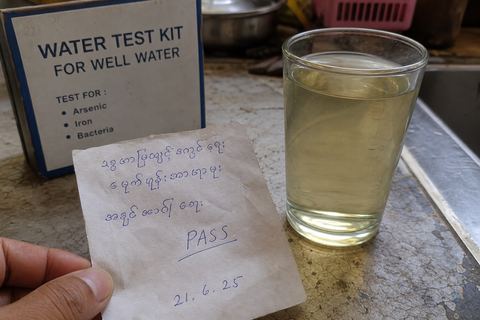 Handwritten well test note that says passed without naming the arsenic limit